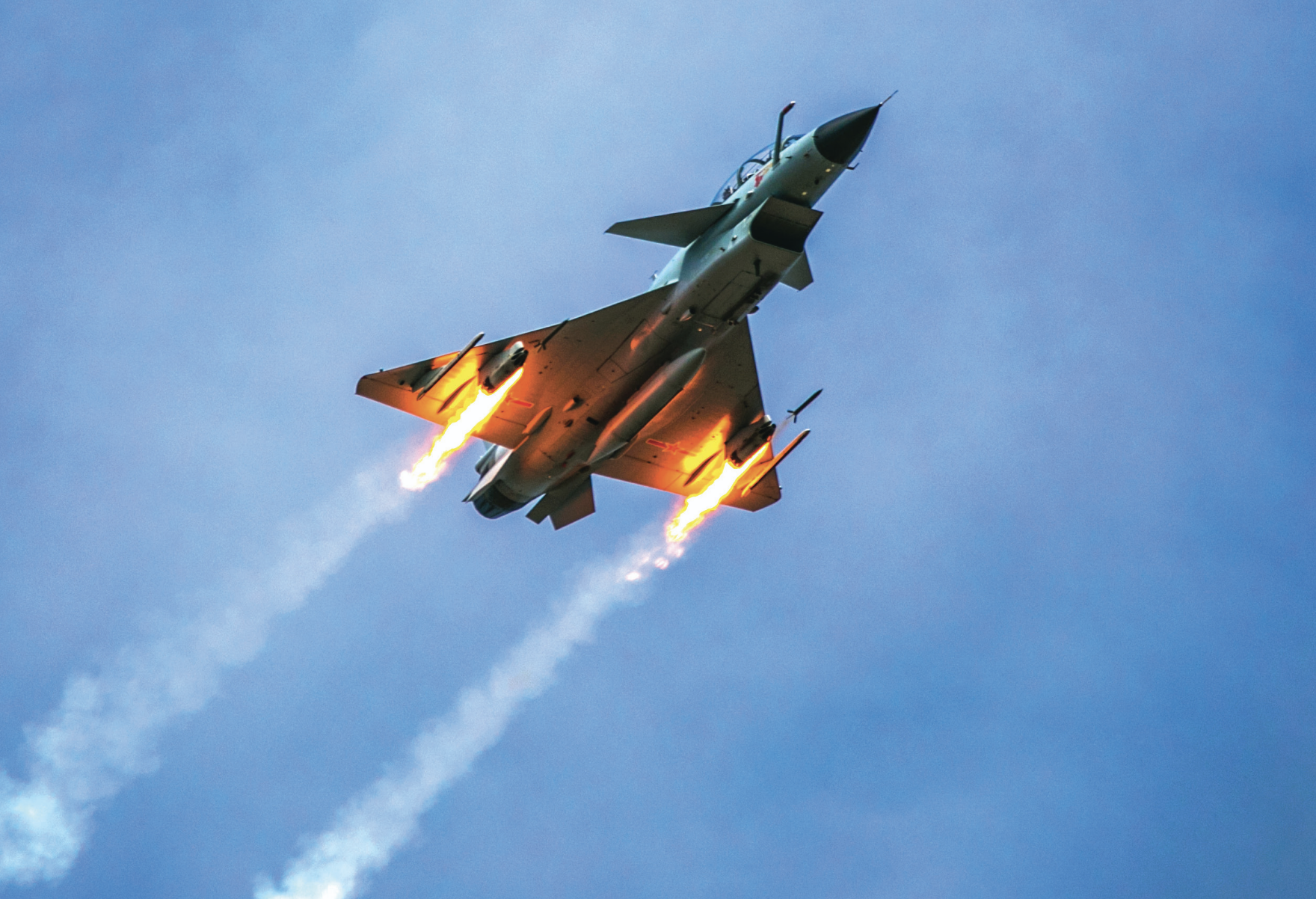 People’s Liberation Army Air Force J-10 fighter jet under Southern Theater Command fires rockets at simulated ground targets during live-fireflight training exercise, April 27, 2020 (Chinese Ministry of National Defense/Xie Zhongwu